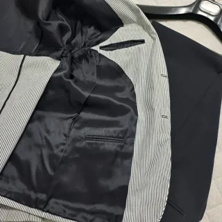 Completo uomo tg.56 righe bianco e nero.