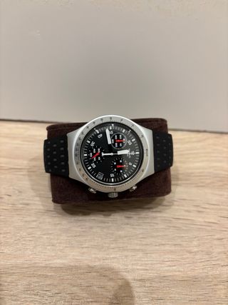 Reloj Swatch Negro y Plateado