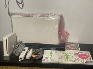 Nintendo Wii + Wii Fit + Wii Party