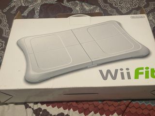 Nintendo Wii + Wii Fit + Wii Party