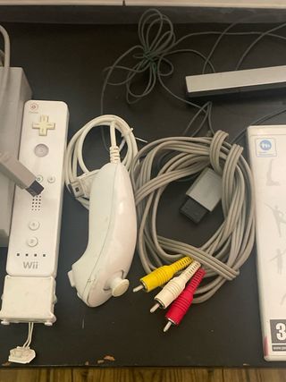 Nintendo Wii + Wii Fit + Wii Party