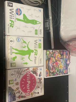 Nintendo Wii + Wii Fit + Wii Party