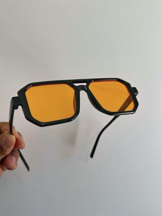 Occhiali da sole quadrati lenti arancioni