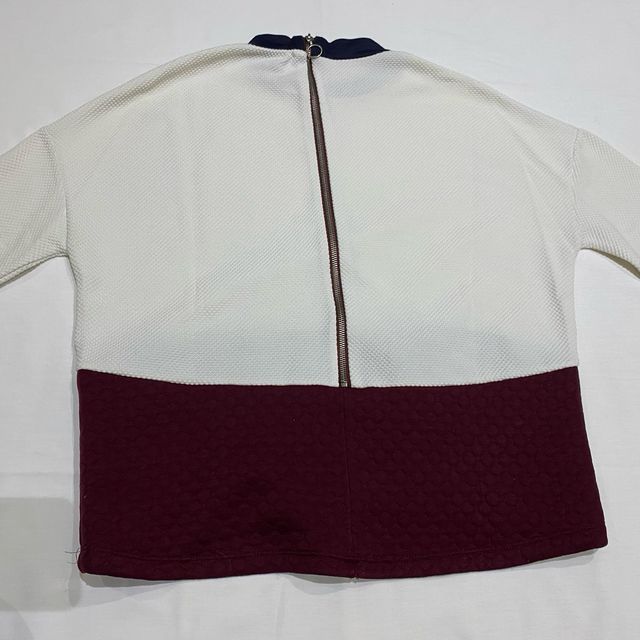 Jersey bicolor cremallera cuello