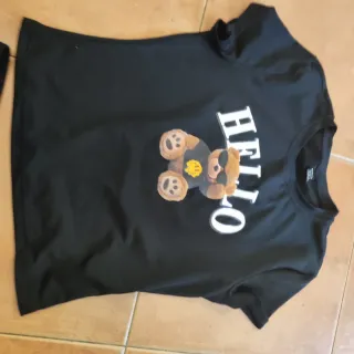 Conjunto corto negro con oso