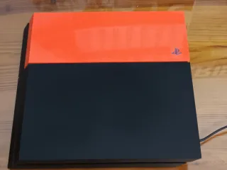 PlayStation 4 PS4 Negra /Naranja incluye un mando