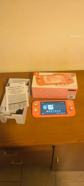 Nintendo Switch Lite Rosa con caja.