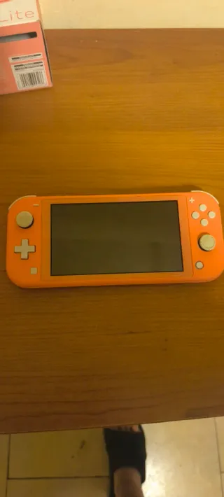 Nintendo Switch Lite Rosa con caja.