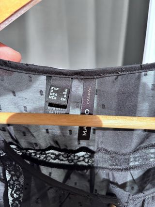Camisa plumeti semitransparente negra. talla grand