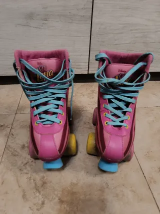 Pattini a rotelle bambina rosa e azzurri