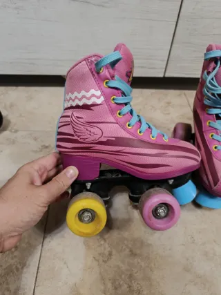 Pattini a rotelle bambina rosa e azzurri