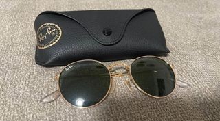 Gafas de sol Ray-Ban doradas y verdes
