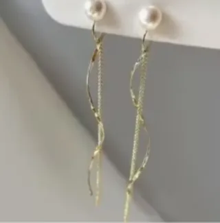 Pendientes largos ondas perla dorados