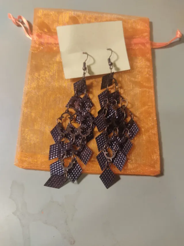 Pendientes Arima Marrones y Grises