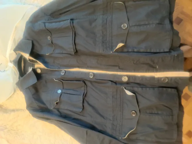 Chaqueta azul marino con bolsillos