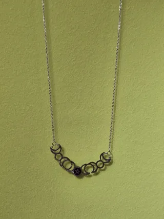 Collar con colgante de lunas y pentagrama