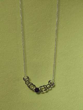 Collar con colgante de lunas y pentagrama