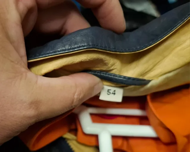 Chaqueta de piel By Patricia gris y amarilla