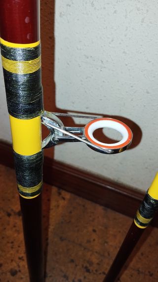 Caña de pescar de tres tramos.