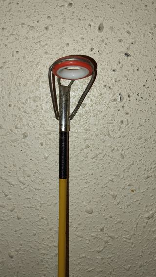 Caña de pescar de tres tramos.