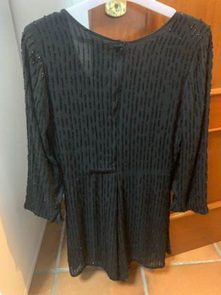 Mono negro con pedrería