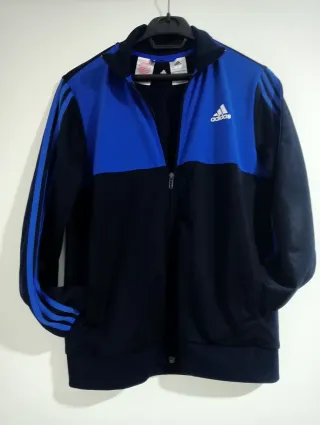 8€Chaqueta ADIDAS azul  talla 13-14 años 