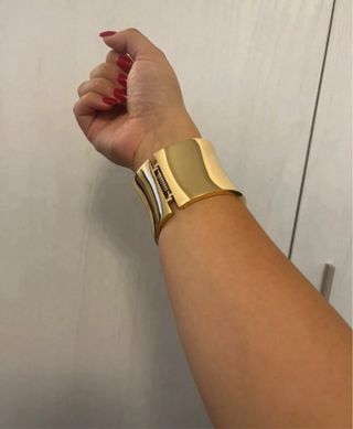 Bracciale rigido dorato Max Mara