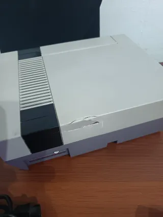 Consola Nintendo NES con mandos y juegos