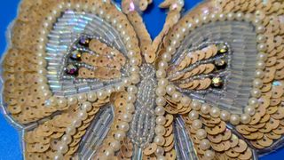 Farfalla decorativa paillettes e perline