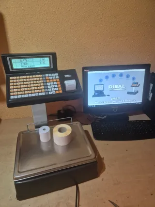 Báscula DIBAL con ticket y pegatinas GARANTIA 
