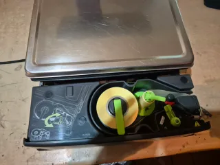 Báscula DIBAL con ticket y pegatinas GARANTIA 