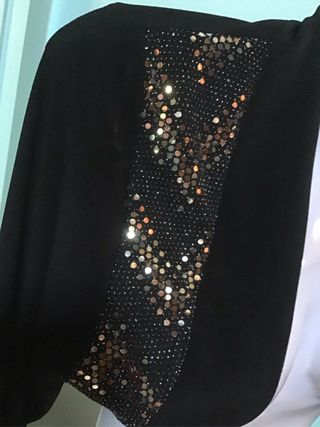 Bolero nero con lustrini