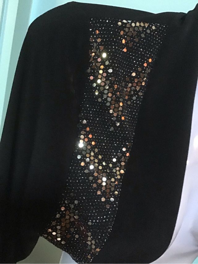 Bolero nero con lustrini
