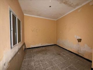 Casa adosada en venta en Tomelloso