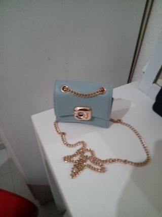 Bolso de fiesta azul y dorado