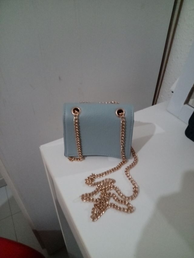Bolso de fiesta azul y dorado