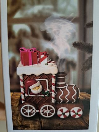 Figura navideña para incienso tren de jengibre.