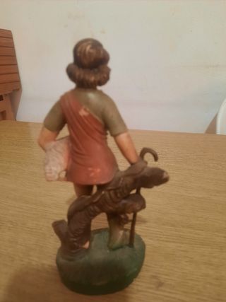 Statuina presepe pastore con agnello