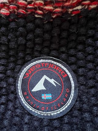 Cappello Westfjord con treccine e pompon