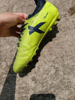 Botas de fútbol Adidas verdes y amarillas