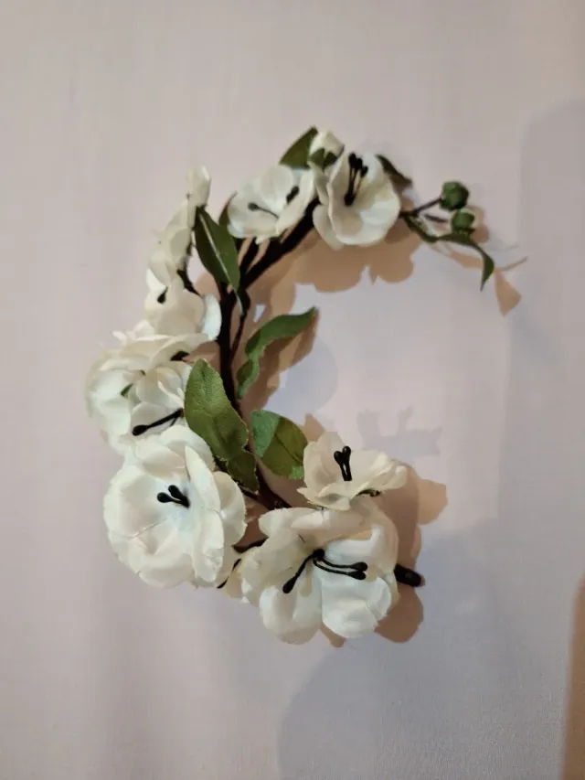 Adorno flores pelo traje Alicantina