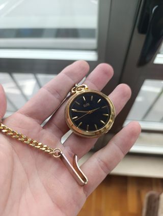 Reloj de bolsillo Elite dorado y negro