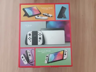 NUEVA Nintendo Switch OLED Blanca + 3 Juegos