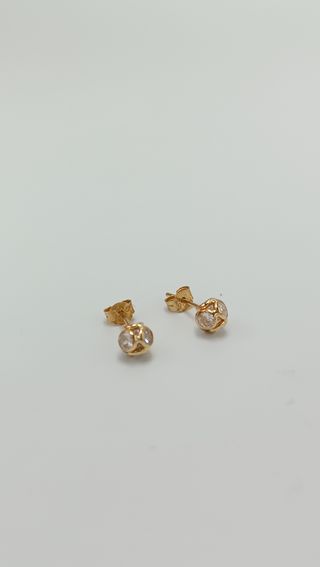 Pendientes de oro de 18kt y circonitas.