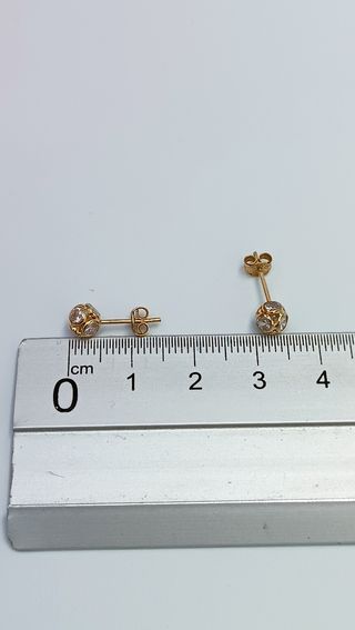 Pendientes de oro de 18kt y circonitas.