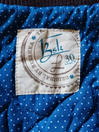 Chaqueta bomber cuadros Bershka azul y marrón