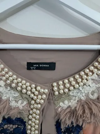 Chaqueta Mia Donna con detalles hechos a mano