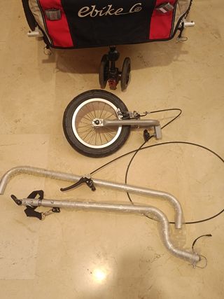 Rimorchio per bici elettriche per bambini.
