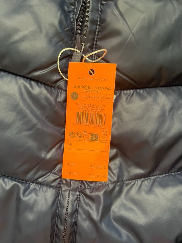 Abrigo acolchado azul marino para niño