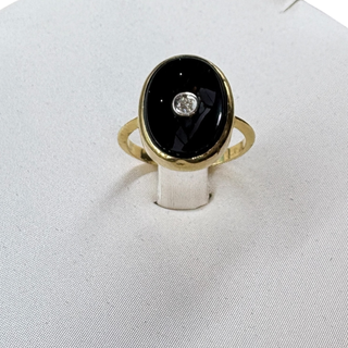 Anillo oro ónix y diamante 